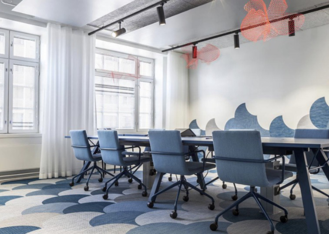 carpet tiles with nautic scale pattern in blue grey and white for meeting space in office